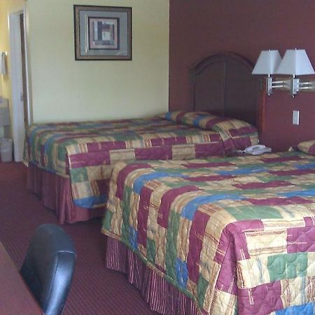 Scottish Inns Suites East Sam Houston Pkwy North Channelview Room photo