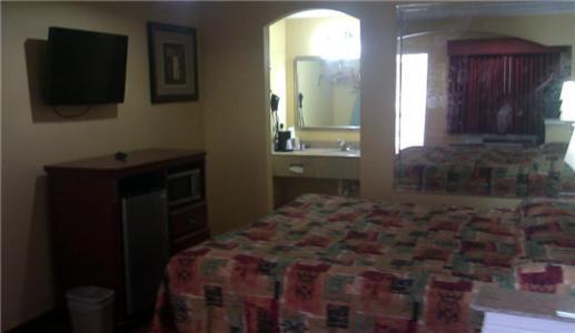 Scottish Inns Suites East Sam Houston Pkwy North Channelview Room photo